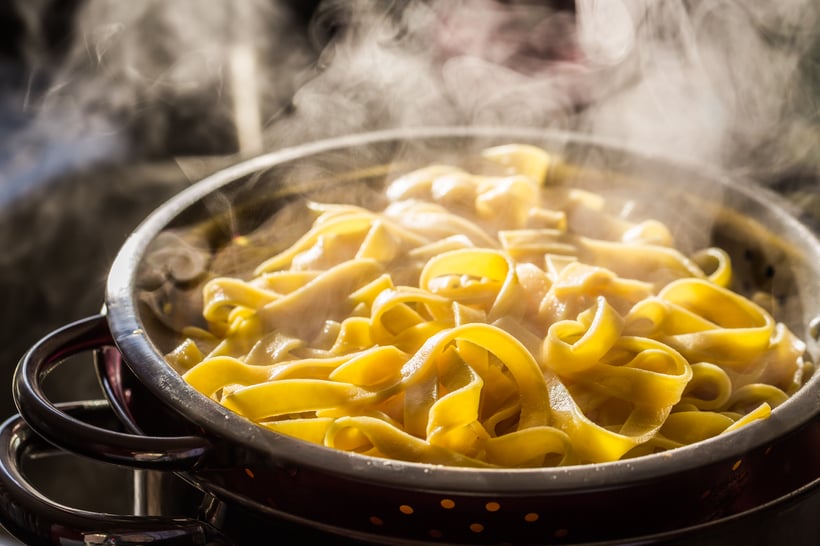 steaming-strainer-of-noodles-2023-11-27-05-21-09-utc