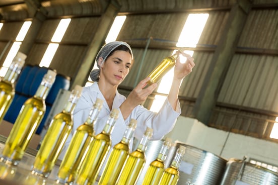 technician-examining-olive-oil